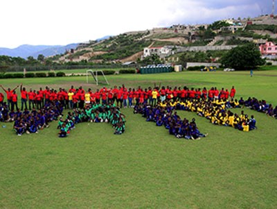 Team Fleur De Vie and the students | Photo by Johnny Louis/jlnphotography.com