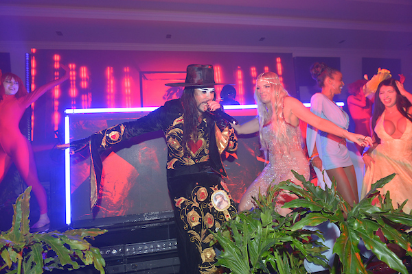 Luke Steele (C) of Empire of the Sun band perform at the Pegasus World Cup 2026 at Gulfstream Park ( Photo by Johnny Louis / jlnphotography.com )